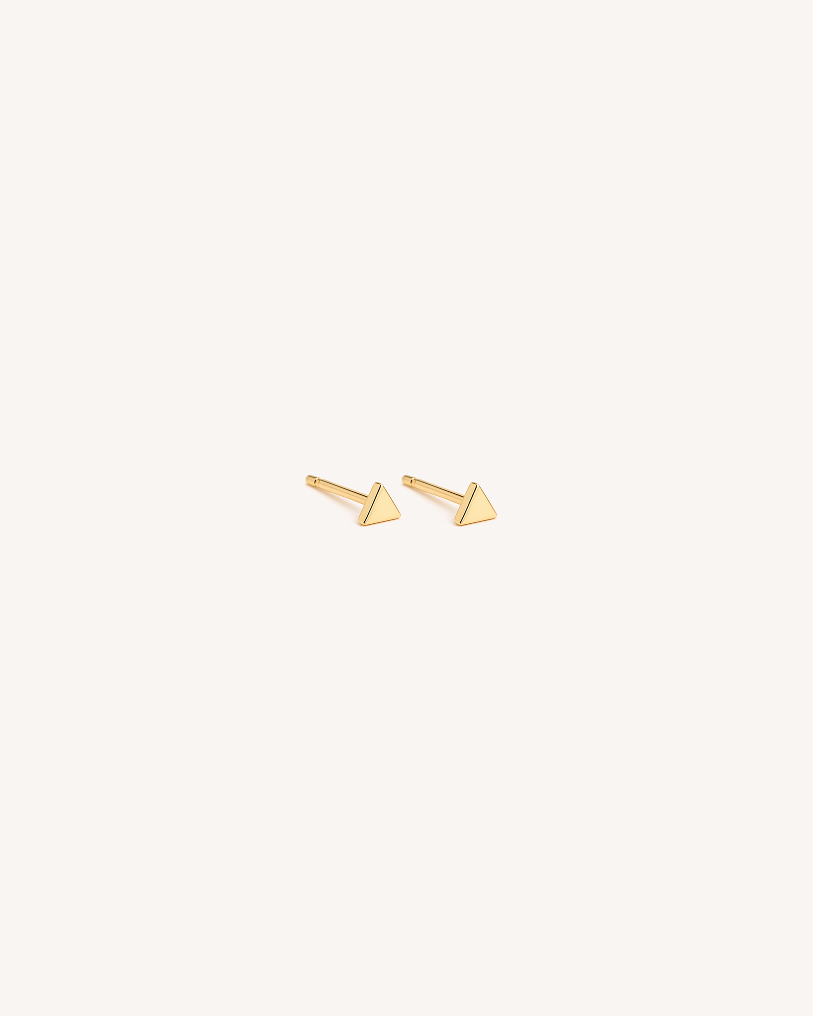Tiny Triangle Studs in Gold