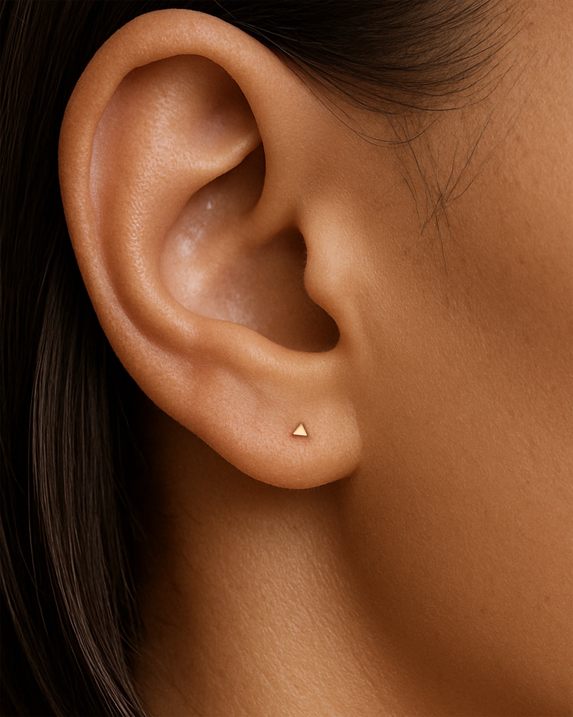 Tiny Triangle Studs in Gold — alternate view