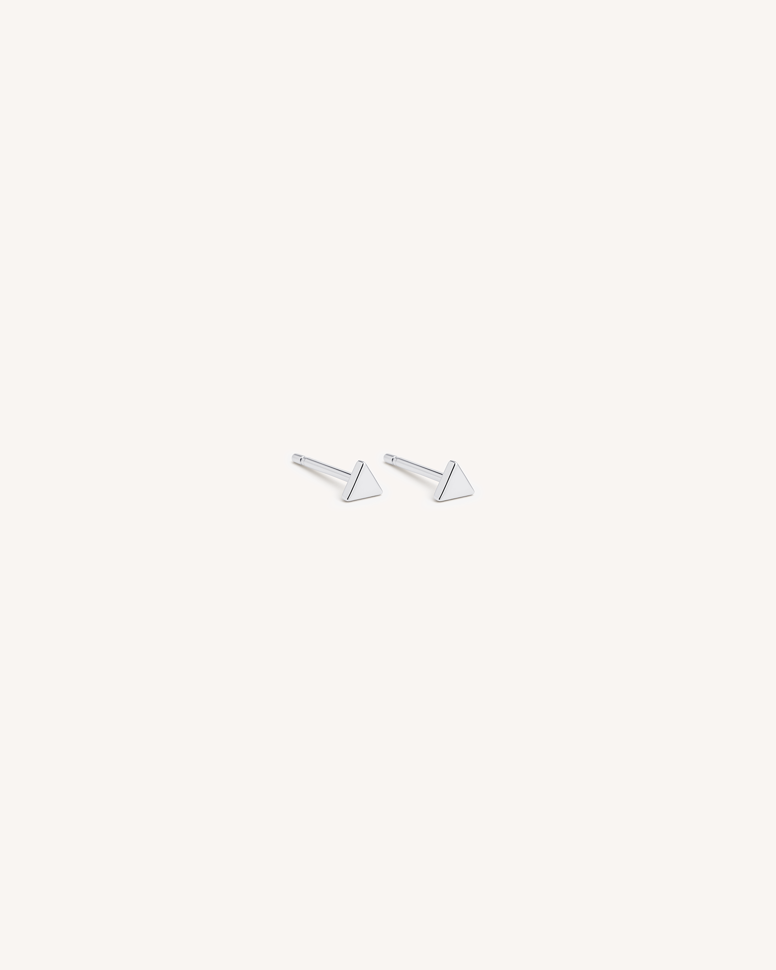 Tiny Triangle Studs in Silver
