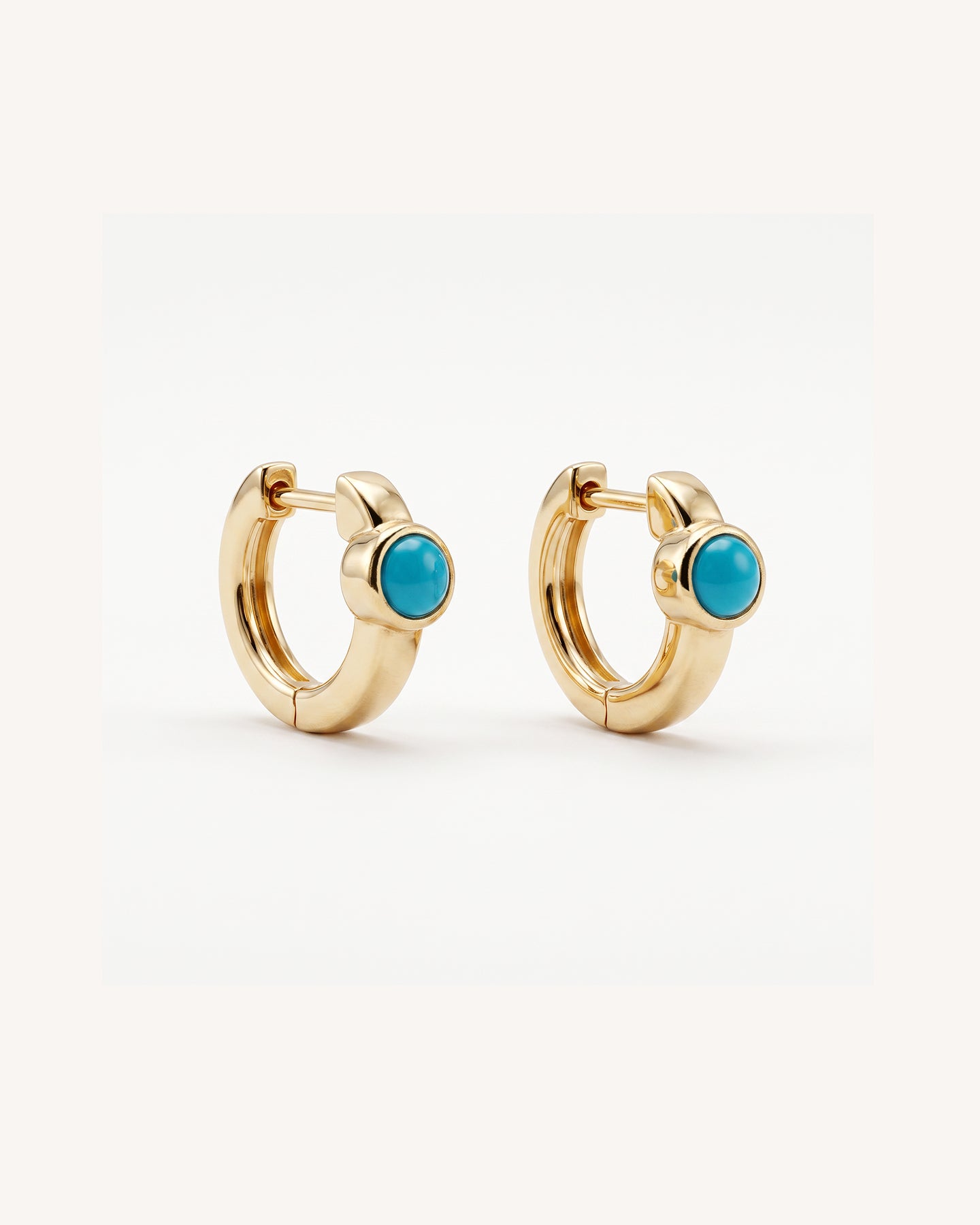 Turquoise Huggie Hoops in Gold