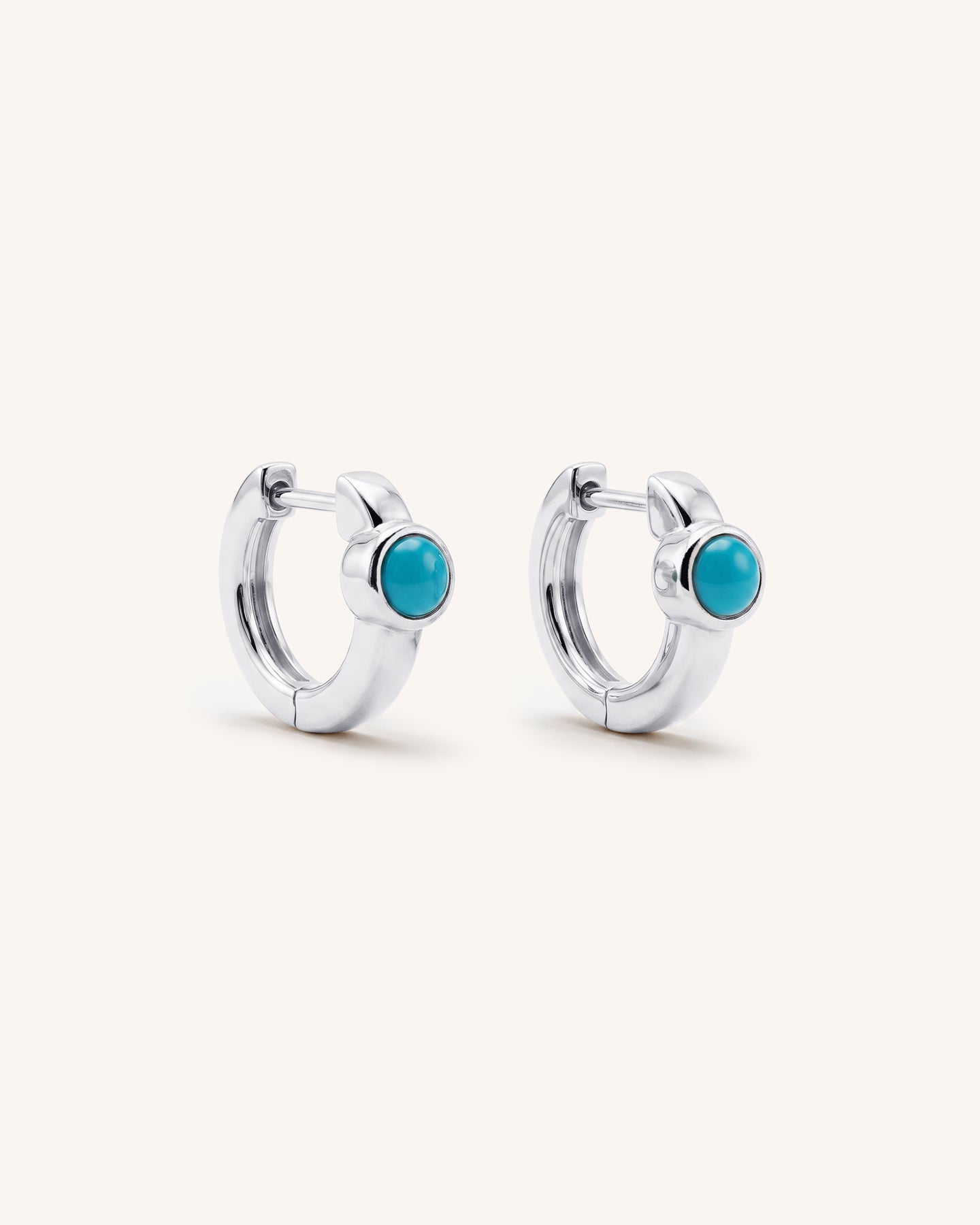 Turquoise Huggie Hoops in Silver